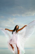 ist1_7730636-woman-wearing-white-dress-with-wings